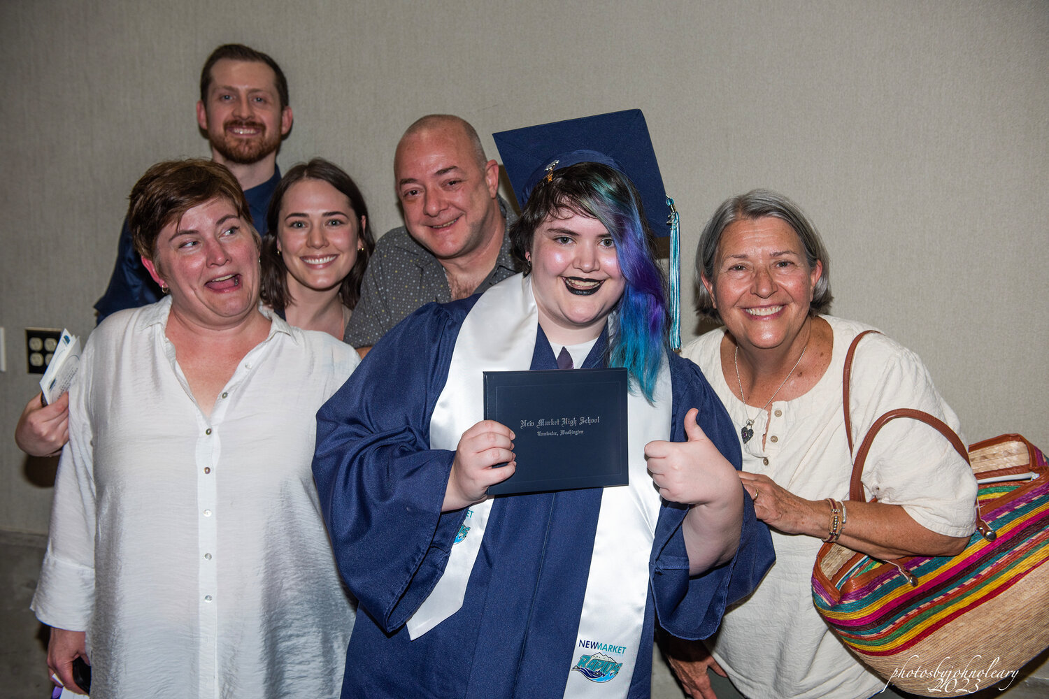 A New Market High School graduate with her family.